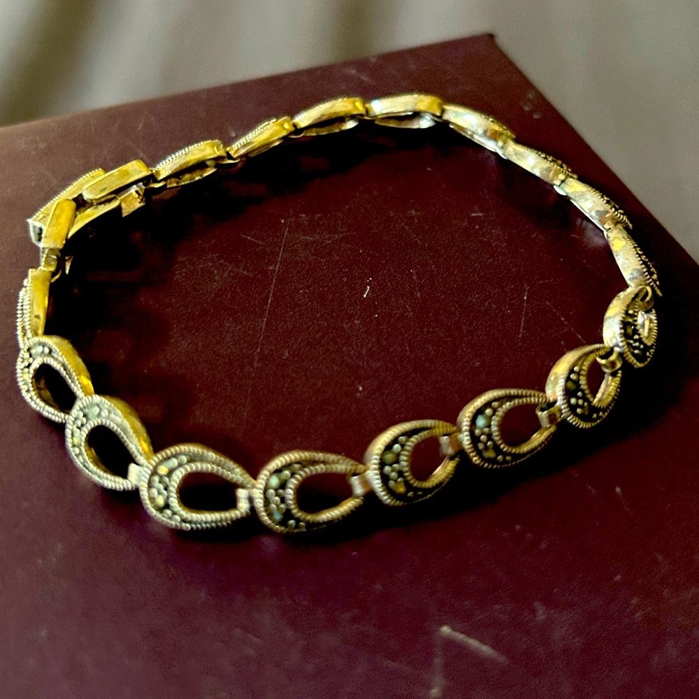 Bracelet with Black/Silver design; perfect condition